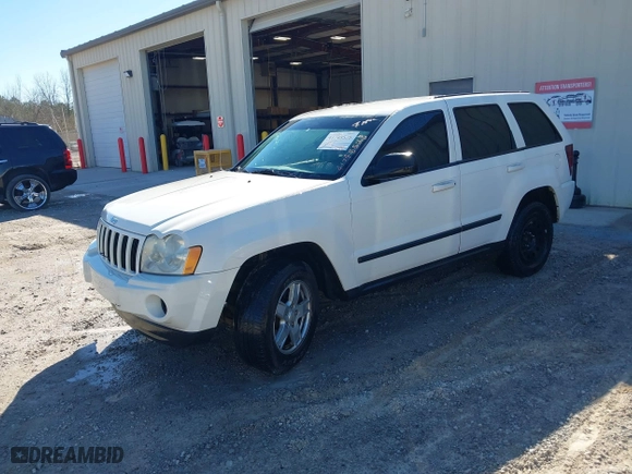 2007 Jeep Grand Cherokee Laredo with VIN 1J8HS48PX7C657685, listed as a IAAI auction lot 41748528 with 247,534 mi miles. Bid and sale history available at carsss.com. Image 2.
