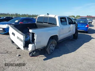 2023 Toyota Tacoma SR with VIN 3TMCZ5AN2PM649123, listed as a IAAI auction lot 41687819 with 44,383 mi miles and . Bid and sale history available at DreamBid. Image 4.