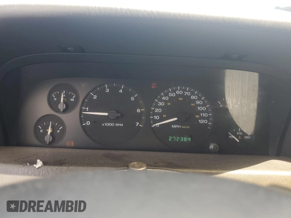 1999 Jeep Grand Cherokee Laredo with VIN 1J4GW58N7XC799434, listed as a Copart auction lot 64790905 with 272,384 mi miles and Salvage title. Bid and sale history available at DreamBid. Image 9.