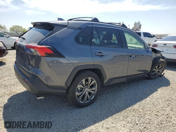 2025 Toyota RAV4 Hybrid XLE Premium with VIN JTMB6RFV8SD152327, listed as a Copart auction lot 53573615 with 12,830 mi miles and Salvage title. Bid and sale history available at DreamBid. Image 3.