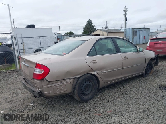 2002 Toyota Camry LE z VIN 4T1BE32K72U028489, wystawiony jako IAAI lot #41760604 z przebiegiem 163 950 mil mil oraz . Historia ofert i sprzedaży dostępna na DreamBid. Obrazek 4.