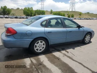 2006 Ford Taurus SE with VIN 1FAHP53296A241444, listed as a Copart auction lot 58343615 with 125,385 mi miles and Salvage title. Bid and sale history available at DreamBid. Image 3.
