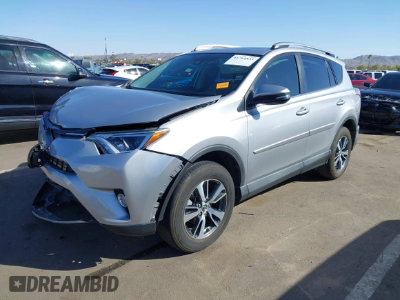2017 Toyota RAV4 XLE with VIN 2T3WFREV2HW405480, listed as a IAAI auction lot 41764833 with 41,785 mi miles and . Bid and sale history available at DreamBid. Image 2.