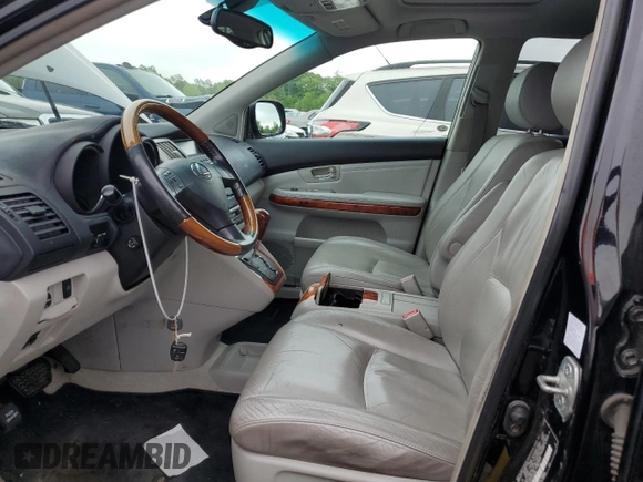 2004 Lexus RX 330 with VIN 2T2HA31U74C007666, listed as a Copart auction lot 56555585 with 200,169 mi miles and Salvage Title. Bid and sale history available at DreamBid. Image 7.