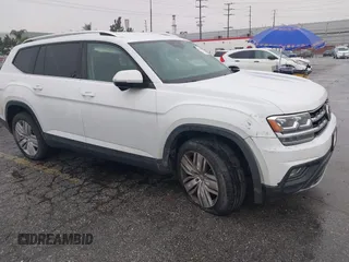 2019 Volkswagen Atlas SE z VIN 1V2WR2CA8KC504134, wystawiony jako IAAI lot #41700050 z przebiegiem 97 047 mil mil oraz . Historia ofert i sprzedaży dostępna na DreamBid. Obrazek 1.