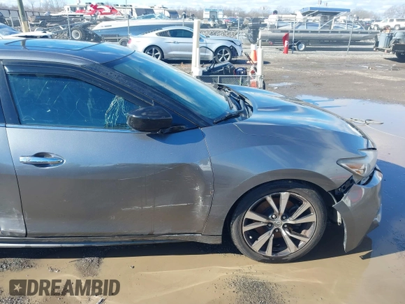 2016 Nissan Maxima Platinum with VIN 1N4AA6AP7GC409949, listed as a IAAI auction lot 41214746 with 190,853 mi miles and . Bid and sale history available at DreamBid. Image 6.