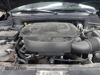 2021 Jeep Grand Cherokee Laredo X with VIN 1C4RJFAG5MC817567, listed as a IAAI auction lot 42297526 with 71,387 mi miles and . Bid and sale history available at DreamBid. Image 10.