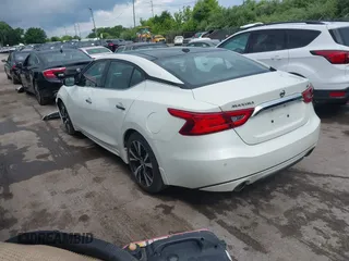 2018 Nissan Maxima SL with VIN 1N4AA6AP2JC395188, listed as a IAAI auction lot 42540832 with 106,898 mi miles and . Bid and sale history available at DreamBid. Image 3.
