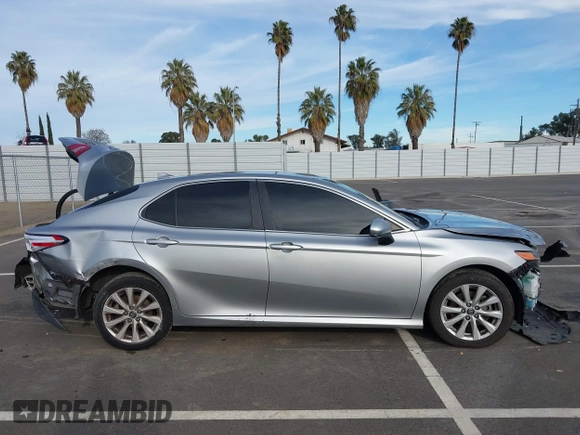 2019 Toyota Camry LE with VIN 4T1B11HK7KU803624, listed as a IAAI auction lot 41589107 with 169,863 mi miles and . Bid and sale history available at DreamBid. Image 13.