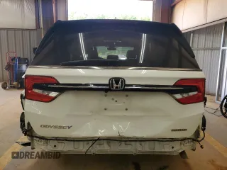 2021 Honda Odyssey Touring with VIN 5FNRL6H89MB018290, listed as a Copart auction lot 55183525 with 77,562 mi miles and Salvage title. Bid and sale history available at DreamBid. Image 6.