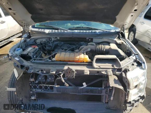 2015 Ford F-150 XL with VIN 1FTEX1C88FFC26544, listed as a Copart auction lot 48242705 with 124,731 mi miles and Salvage Title. Bid and sale history available at carsss.com. Image 11.