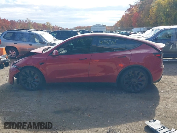 2023 Tesla Model Y Performance with VIN 7SAYGDEF6PF870935, listed as a IAAI auction lot 40718563 with 15,286 mi miles and . Bid and sale history available at DreamBid. Image 14.
