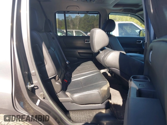 2013 Honda Pilot Touring with VIN 5FNYF3H92DB001308, listed as a IAAI auction lot 42007426 with 225,869 mi miles and . Bid and sale history available at DreamBid. Image 8.
