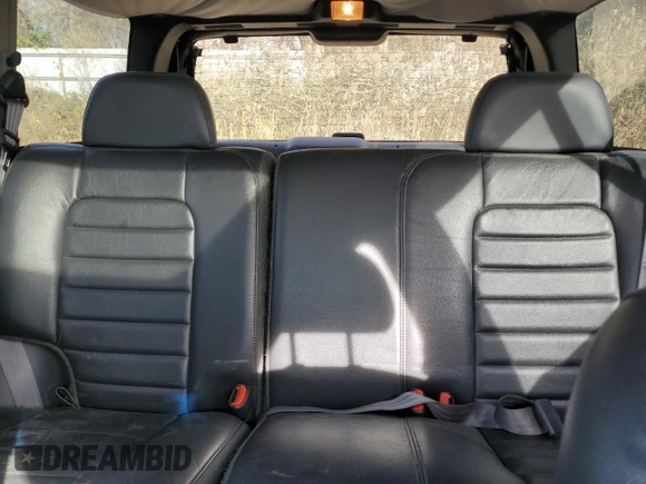 1998 Jeep Grand Cherokee Laredo with VIN 1J4GZ48YXWC299827, listed as a Copart auction lot 76898264 with 232,656 mi miles and Clean Title. Bid and sale history available at carsss.com. Image 10.