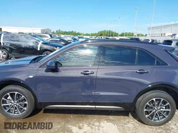 2024 Cadillac XT4 FWD Sport with VIN 1GYFZER40RF226384, listed as a IAAI auction lot 42220804 with 8,743 mi miles and . Bid and sale history available at DreamBid. Image 15.