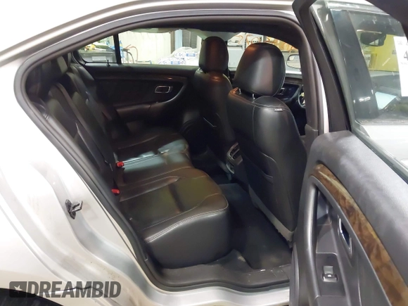 2013 Ford Taurus Limited with VIN 1FAHP2F83DG116657, listed as a IAAI auction lot 41533075 with 124,649 mi miles. Bid and sale history available at carsss.com. Image 8.