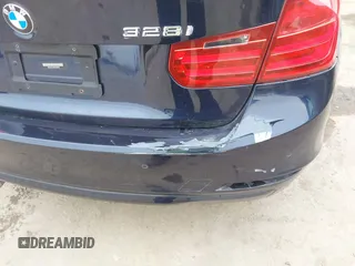 2014 BMW 3 Series 328i with VIN WBA3C1C56EK108665, listed as a IAAI auction lot 42101319 with 84,928 mi miles and . Bid and sale history available at DreamBid. Image 20.