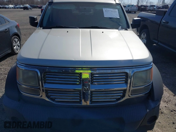 2008 Dodge Nitro SXT with VIN 1D8GU28K68W271921, listed as a IAAI auction lot 41772124 with 233,078 mi miles. Bid and sale history available at carsss.com. Image 6.