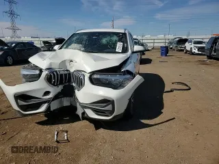 2021 BMW X1 xDrive28i z VIN WBXJG9C02M5S18999, wystawiony jako Copart lot #50194425 z przebiegiem 62 355 mil mil oraz Szkoda całkowita • Salvage title. Historia ofert i sprzedaży dostępna na DreamBid. Obrazek 11.