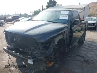 2012 Ram 1500 Express with VIN 3C6JD7AT0CG239839, listed as a IAAI auction lot 41468268 with 146,709 mi miles. Bid and sale history available at carsss.com. Image 2.