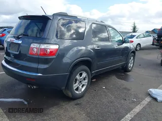 2012 GMC Acadia SL z VIN 1GKKRNED5CJ279777, wystawiony jako IAAI lot #41647968 z przebiegiem 165 404 mil mil oraz . Historia ofert i sprzedaży dostępna na DreamBid. Obrazek 4.