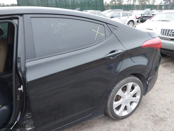 2012 Hyundai Elantra GLS with VIN KMHDH4AE4CU217877, listed as a IAAI auction lot 41927929 with 999,999 mi miles. Bid and sale history available at carsss.com. Image 6.