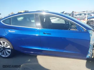 2019 Tesla Model 3 Long Range with VIN 5YJ3E1EB3KF497841, listed as a IAAI auction lot 41969728 with 21,127 mi miles. Bid and sale history available at carsss.com. Image 14.