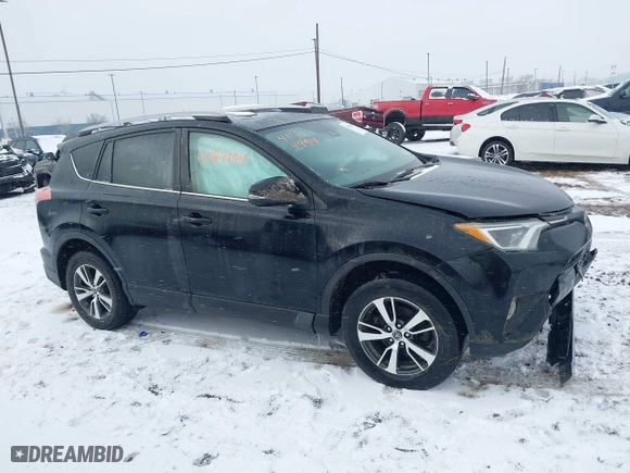 2018 Toyota RAV4 XLE with VIN 2T3RFREV8JW851250, listed as a IAAI auction lot 41164994 with 63,005 mi miles. Bid and sale history available at carsss.com. Image 13.