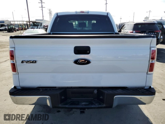 2014 Ford F-150 XL with VIN 1FTFW1CT1EKE22892, listed as a Copart auction lot 61635265 with 14,203 mi miles and Salvage title. Bid and sale history available at DreamBid. Image 6.