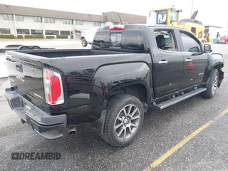 2018 GMC Canyon 4WD Denali with VIN 1GTG6EEN7J1318059, listed as a IAAI auction lot 41772860 with 80,230 mi miles. Bid and sale history available at carsss.com. Image 4.