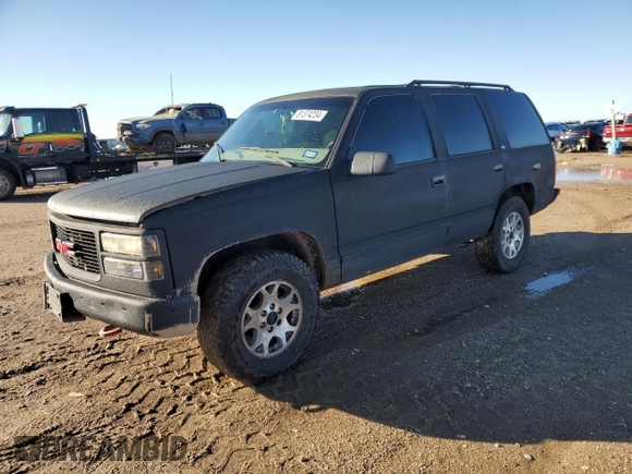 1997 GMC Yukon with VIN 1GKEK13R0VJ710179, listed as a Copart auction lot 81374234 with 186,257 mi miles and Salvage Title. Bid and sale history available at carsss.com. Image 1.