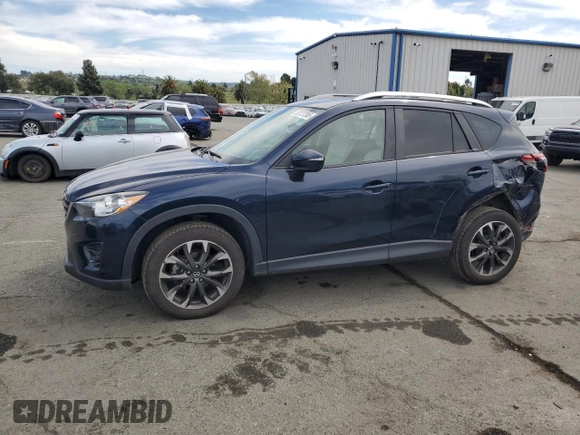 2016 Mazda CX-5 Grand Touring with VIN JM3KE4DY4G0750939, listed as a Copart auction lot 52727395 with 72,428 mi miles and Salvage Title. Bid and sale history available at carsss.com. Image 1.