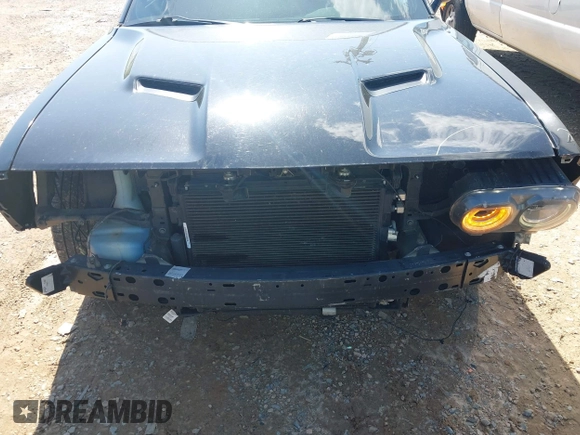 2019 Dodge Challenger SXT z VIN 2C3CDZAG5KH561606, wystawiony jako IAAI lot #41994950 z przebiegiem 97 615 mil mil oraz . Historia ofert i sprzedaży dostępna na DreamBid. Obrazek 6.