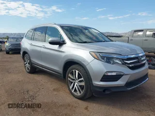 2017 Honda Pilot Elite with VIN 5FNYF6H03HB091299, listed as a IAAI auction lot 42662585 with 130,739 mi miles and . Bid and sale history available at DreamBid. Image 1.