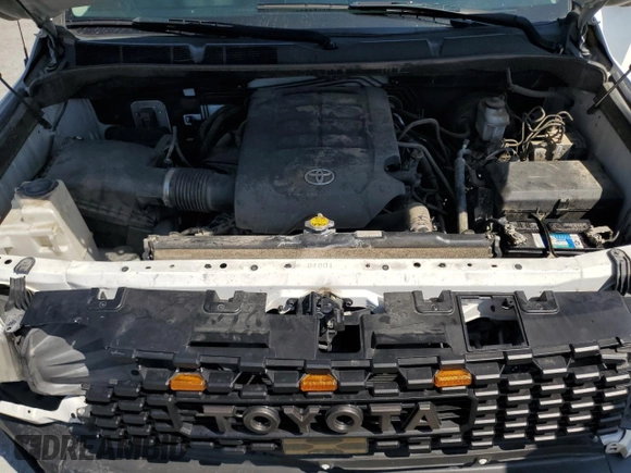 2015 Toyota Tundra SR z VIN 5TFRM5F13FX093914, wystawiony jako Copart lot #58087635 z przebiegiem 128 685 mil mil oraz Szkoda całkowita • Salvage title. Historia ofert i sprzedaży dostępna na DreamBid. Obrazek 11.