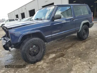 1997 Jeep Cherokee SE with VIN 1J4FT27P0VL612859, listed as a Copart auction lot 49869915 with 198,702 mi miles and Salvage title. Bid and sale history available at DreamBid. Image 1.