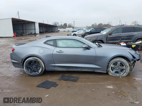 2020 Chevrolet Camaro 1LT z VIN 1G1FB1RX9L0128079, wystawiony jako IAAI lot #41173693 z przebiegiem 88 846 mil mil oraz . Historia ofert i sprzedaży dostępna na DreamBid. Obrazek 13.