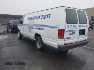 2008 Ford Econoline Cargo Commercial with VIN 1FTNS24L38DA02653, listed as a IAAI auction lot 41118303 with 185,433 mi miles and . Bid and sale history available at DreamBid. Image 3.