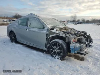 2022 Toyota Camry Hybrid SE with VIN 4T1G31AK7NU586705, listed as a Copart auction lot 83523564 with 56,638 mi miles and Salvage Title. Bid and sale history available at carsss.com. Image 4.