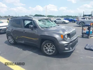 2019 Jeep Renegade Latitude z VIN ZACNJABB0KPK03648, wystawiony jako IAAI lot #42324860 z przebiegiem 59 313 mil mil oraz . Historia ofert i sprzedaży dostępna na DreamBid. Obrazek 1.