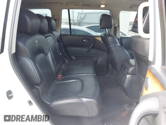 2012 Infiniti QX56 8-passenger with VIN JN8AZ2NC3C9317218, listed as a IAAI auction lot 42068393 with 221,820 mi miles. Bid and sale history available at carsss.com. Image 8.