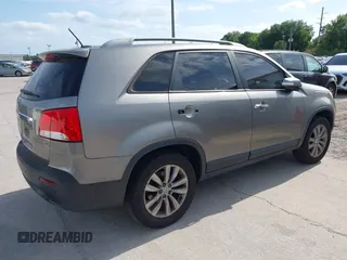 2011 Kia Sorento EX with VIN 5XYKU4A10BG113603, listed as a IAAI auction lot 42123052 with 238,437 mi miles. Bid and sale history available at carsss.com. Image 4.