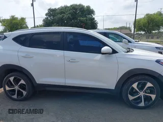 2016 Hyundai Tucson Limited with VIN KM8J33A2XGU030795, listed as a IAAI auction lot 42108969 with 117,418 mi miles. Bid and sale history available at carsss.com. Image 13.