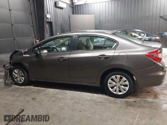 2012 Honda Civic LX z VIN 19XFB2F59CE373830, wystawiony jako IAAI lot #42312118 z przebiegiem 106 541 mil mil oraz . Historia ofert i sprzedaży dostępna na DreamBid. Obrazek 14.