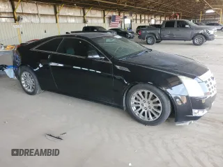 2012 Cadillac CTS Performance with VIN 1G6DJ1E30C0152200, listed as a Copart auction lot 55669815 with 138,764 mi miles and Clean Title. Bid and sale history available at DreamBid. Image 4.