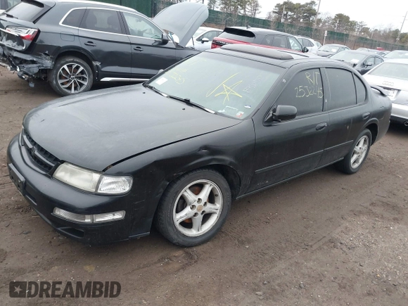 1998 Nissan Maxima GXE z VIN JN1CA21A7WM805575, wystawiony jako IAAI lot #41726198 z przebiegiem Nie podano mil oraz . Historia ofert i sprzedaży dostępna na DreamBid. Obrazek 2.
