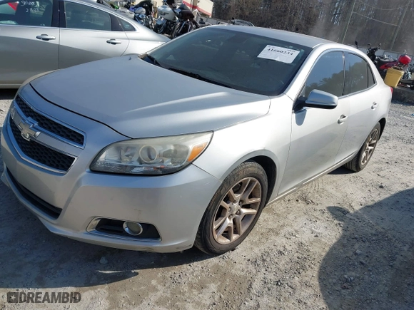 2013 Chevrolet Malibu ECO with VIN 1G11F5RR1DF114358, listed as a IAAI auction lot 41660234 with 136,804 mi miles. Bid and sale history available at carsss.com. Image 2.