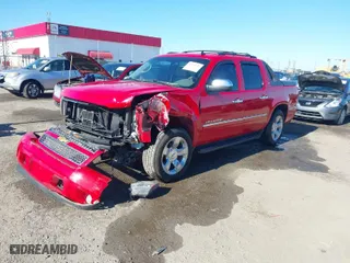 2012 Chevrolet Avalanche LTZ with VIN 3GNTKGE79CG308278, listed as a IAAI auction lot 41036692 with 197,711 mi miles. Bid and sale history available at carsss.com. Image 2.