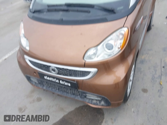 2015 Smart fortwo Passion with VIN WMEEJ9AA4FK831076, listed as a IAAI auction lot 42424797 with Not provided miles and . Bid and sale history available at DreamBid. Image 6.