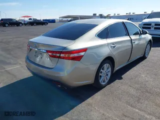 2014 Toyota Avalon Limited with VIN 4T1BK1EBXEU094015, listed as a IAAI auction lot 41415683 with 183,627 mi miles. Bid and sale history available at carsss.com. Image 4.
